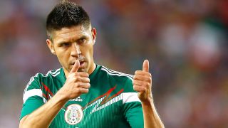 Oribe-Peralta-19-of-Mexico-reacts-to-a-teammate-PI